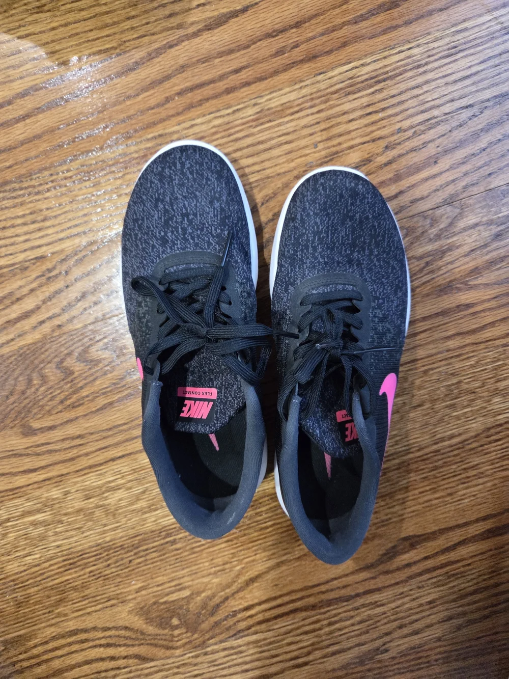 Nike Black Running Sneakers with Pink Swoosh